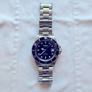 Lightly used, men’s steal Invicta, automatic submariner.